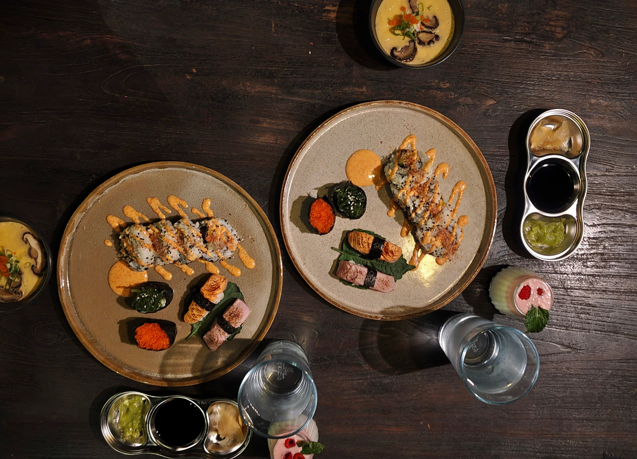 Japanese dishes and bowls arranged across a dining table